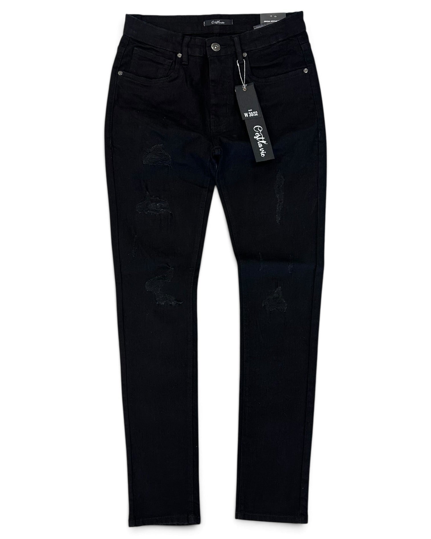 Black distressed skinny jeans with ripped details on the thighs and knees, shown flat against a white background with a hangtag attached.