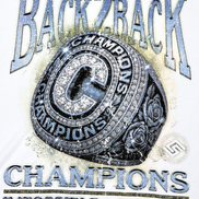 T-shirt with 'Back2Back Champions' text and championship ring graphic on a white background