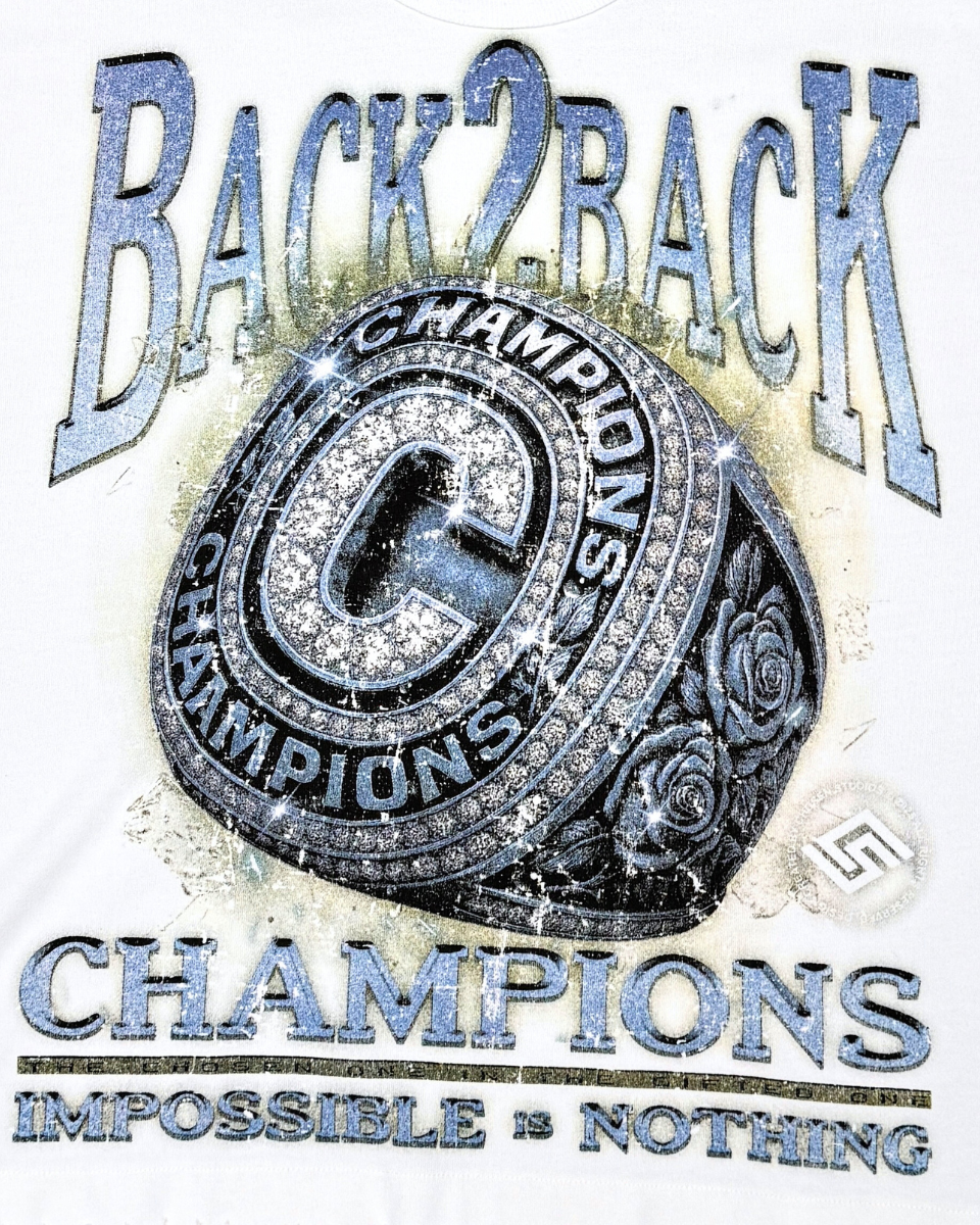T-shirt with 'Back2Back Champions' text and championship ring graphic on a white background