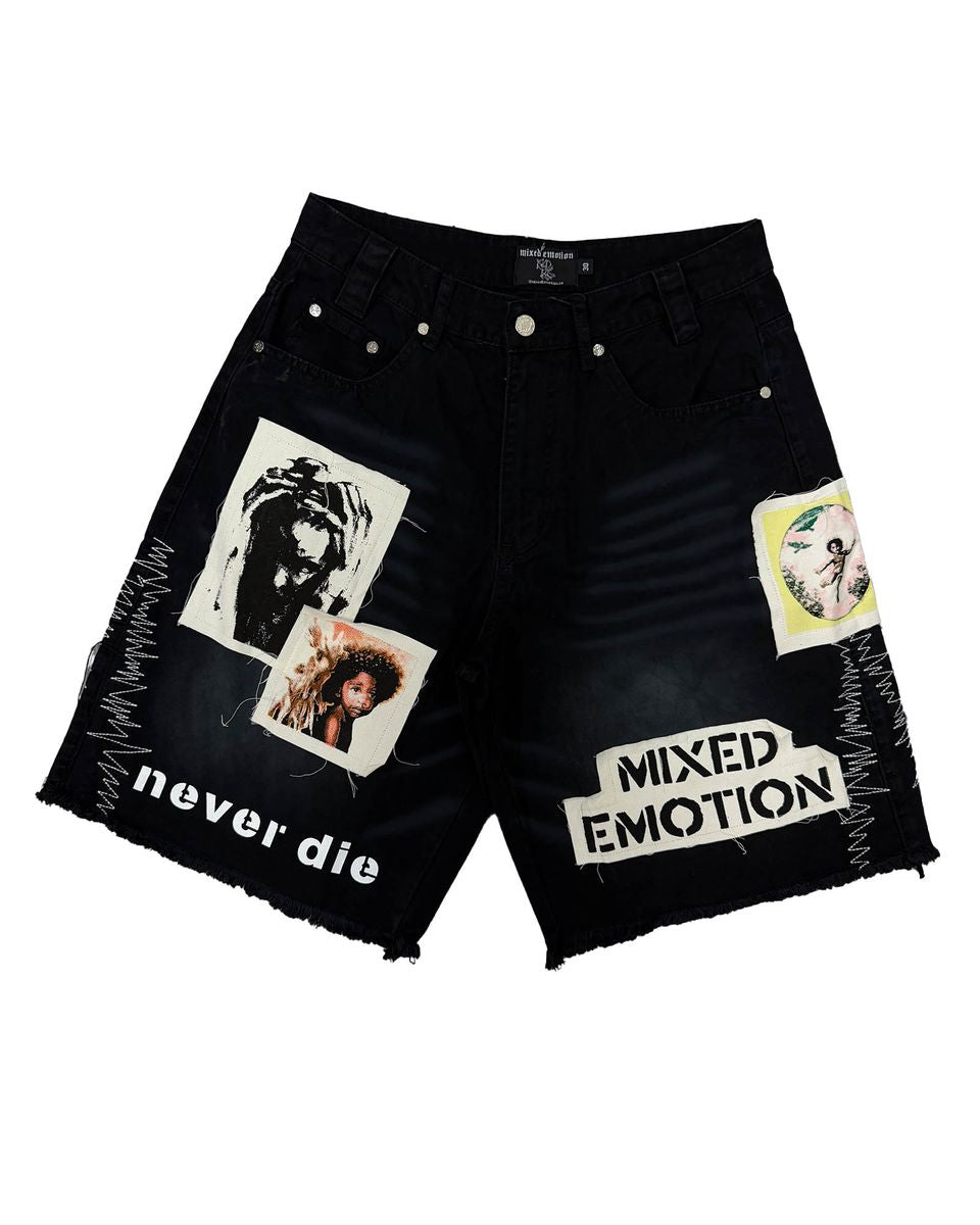 Black denim shorts with graphic designs and text on a white background