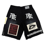 Black shorts with text and graphics on a white background