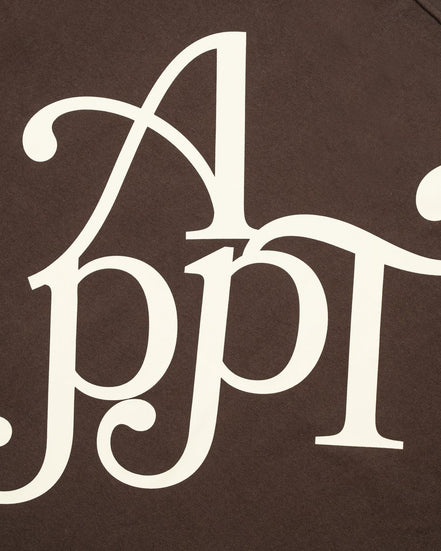 Decorative white monogram on a brown background