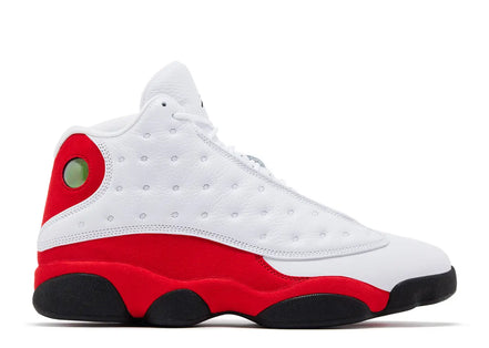 White and red sneaker with black accents on a white background