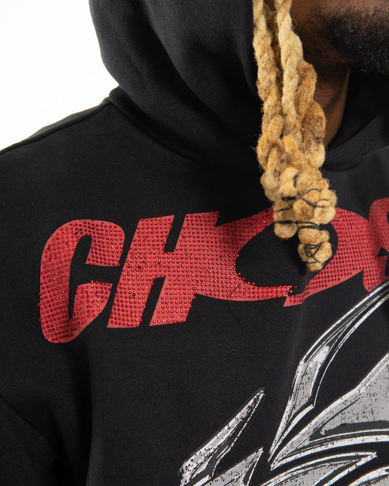 Black hoodie with red text and dragon design, featuring a brand logo.