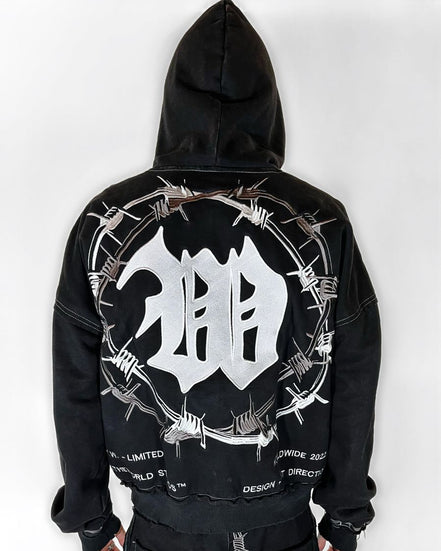 Black hoodie with a white logo and barbed wire design on the back against a white background