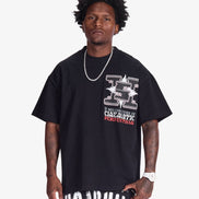 Man wearing a black t-shirt with graphic design and text on a white background