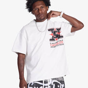 Man wearing a white t-shirt with graphic design on a plain background
