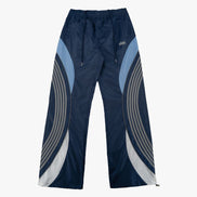 Navy blue pants with gray and light blue geometric patterns on a white background