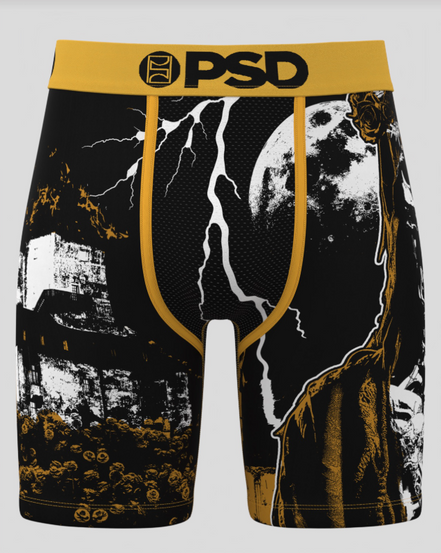 Black and gold boxer briefs with graphic design and 'PSD' branding on a white background
