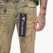 Distressed jeans with a visible brand tag on a white background