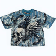 T-shirt with a skull and wings design on a camouflage pattern