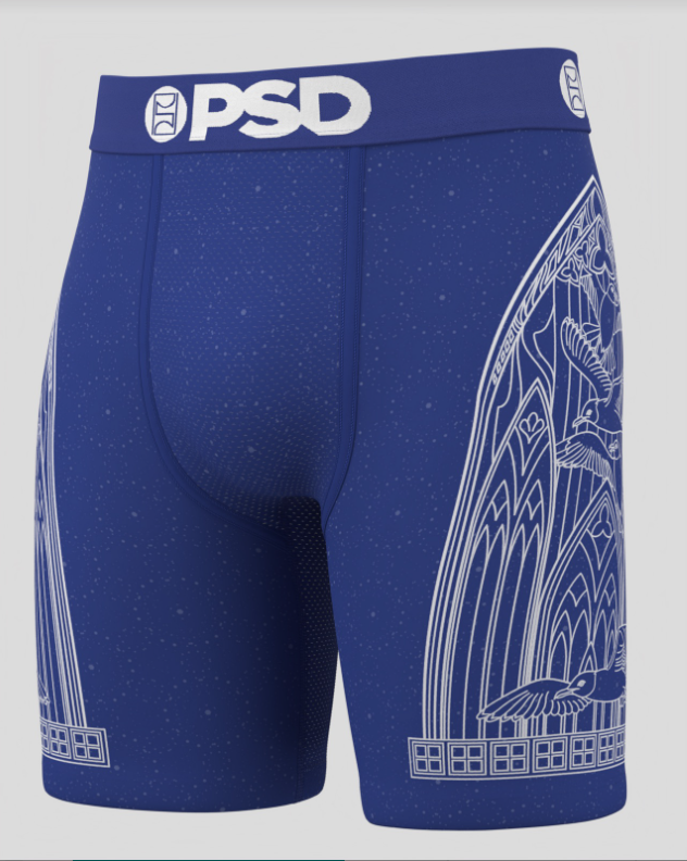 Blue men's underwear with white design and 'PSD' waistband on a gray background