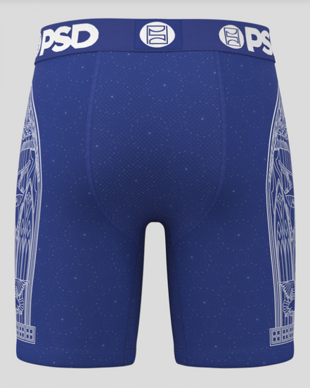 Blue athletic shorts with white patterns and 'PSD' branding on a gray background