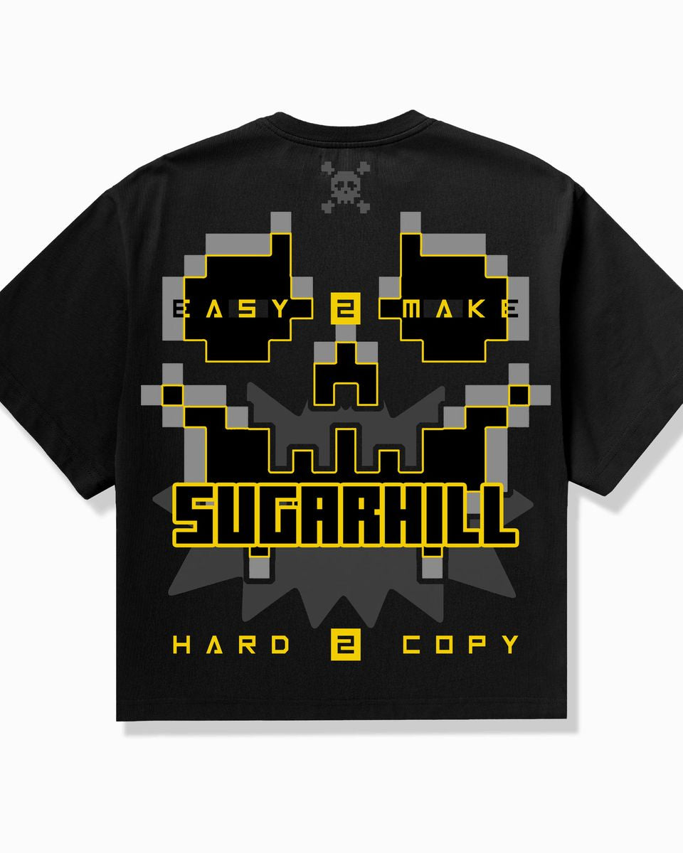 Black t-shirt with pixelated design and text on a white background