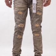 Distressed gray jeans with brand label on a white background
