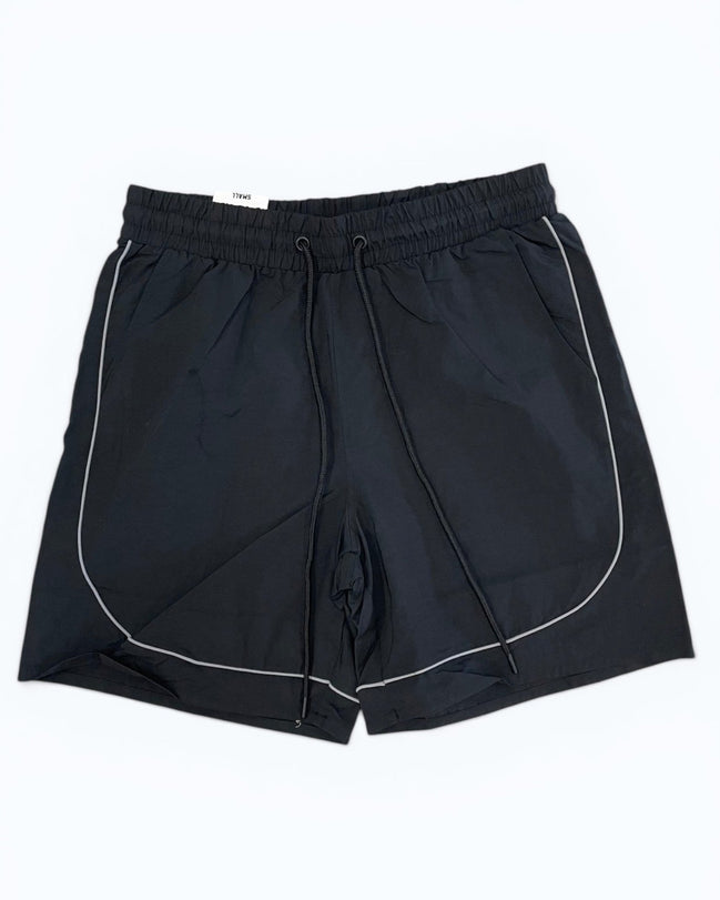 Black shorts with white piping on a white background