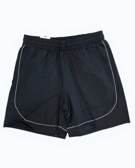 Black shorts with white piping on a white background