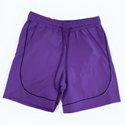 Purple shorts with black piping on a white background