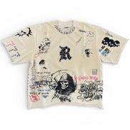 Beige t-shirt with black and white graphics and text on a white background
