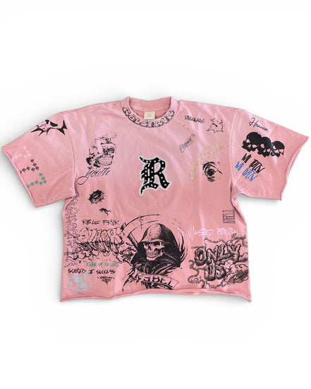 Pink t-shirt with graphic designs on a white background