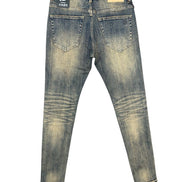 Pair of distressed blue jeans on a white background