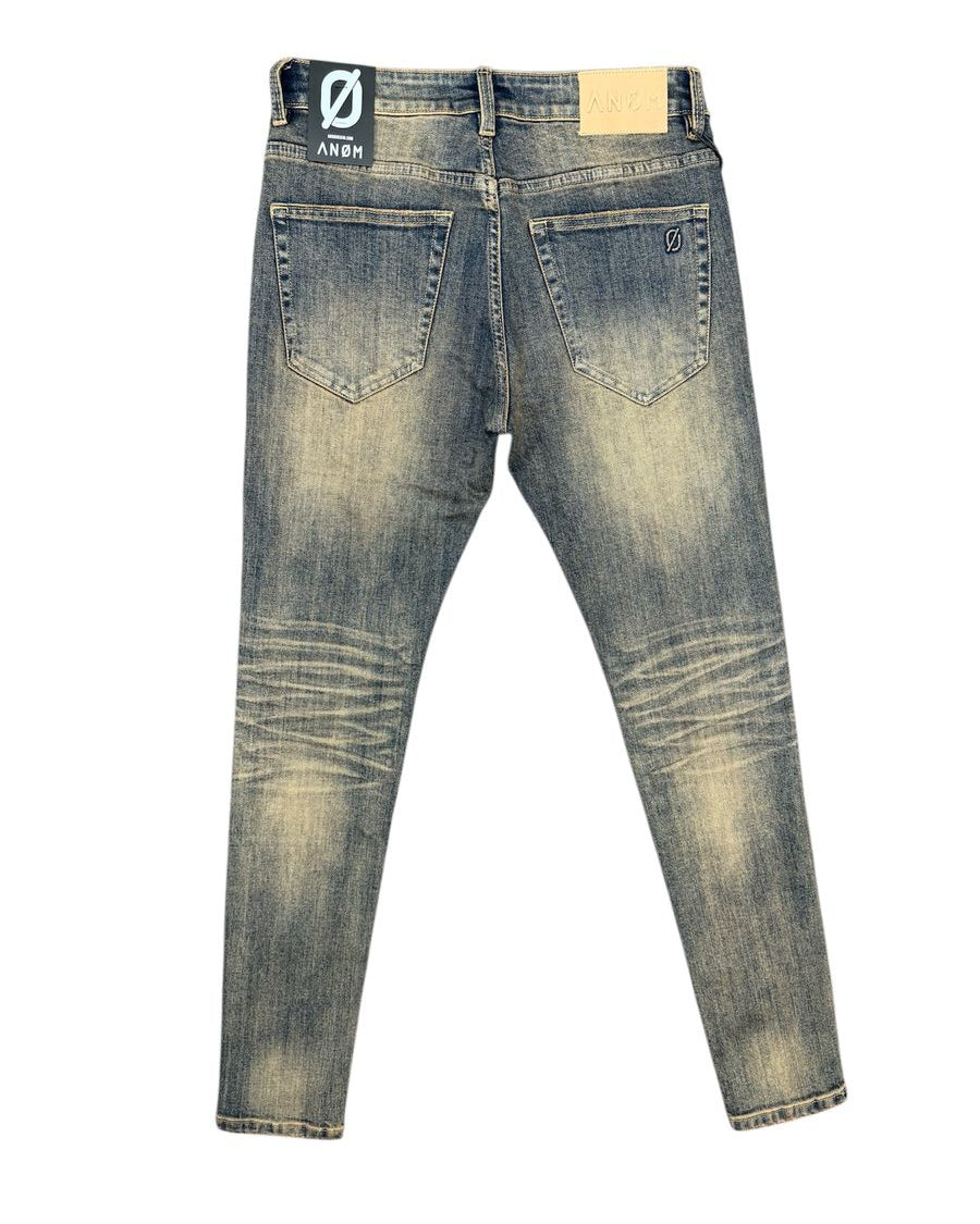 Pair of distressed blue jeans on a white background