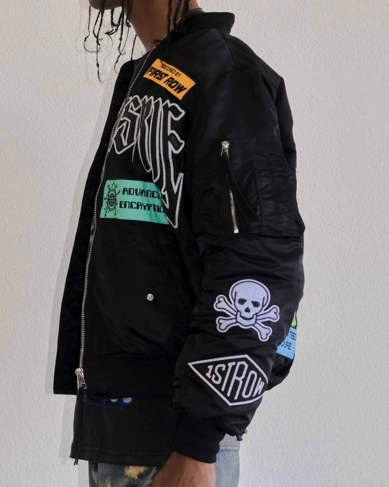 First row caution black bomber jacket 