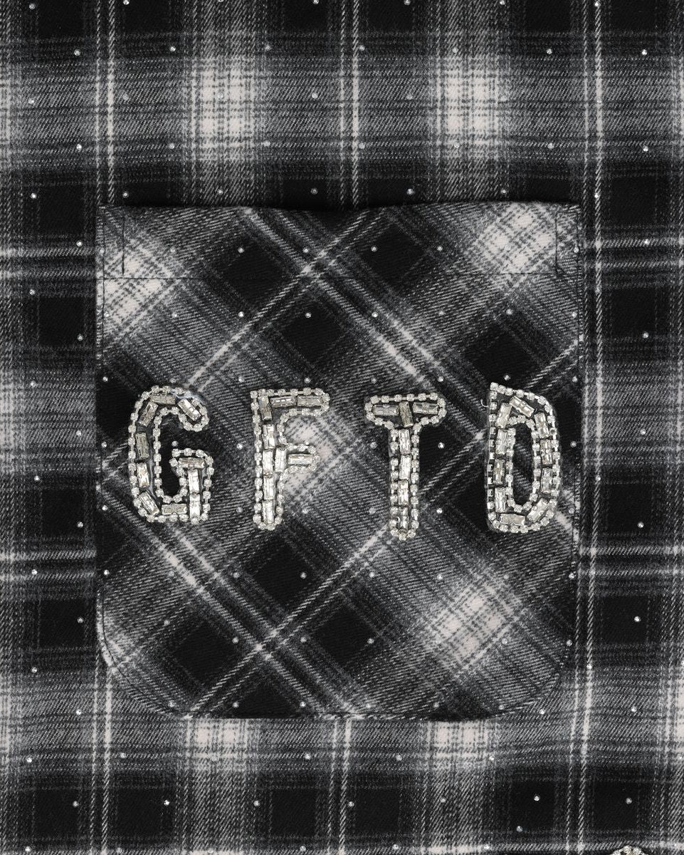 Black and white plaid fabric with 'GFTD' text