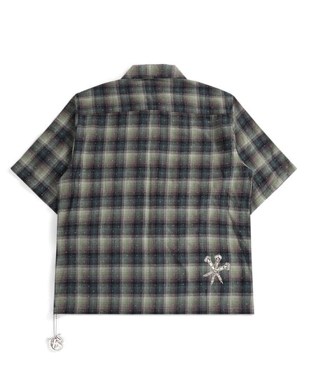 Plaid shirt with a logo on a white background