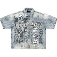 Denim shirt with graphic designs and text on a white background