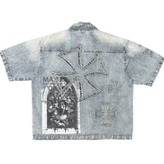 Denim jacket with graphic designs on a white background