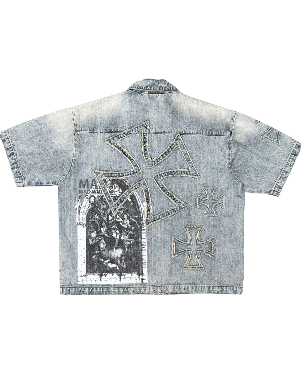 Denim jacket with graphic designs on a white background