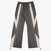 Dark gray pants with white and gray geometric patterns on a white background
