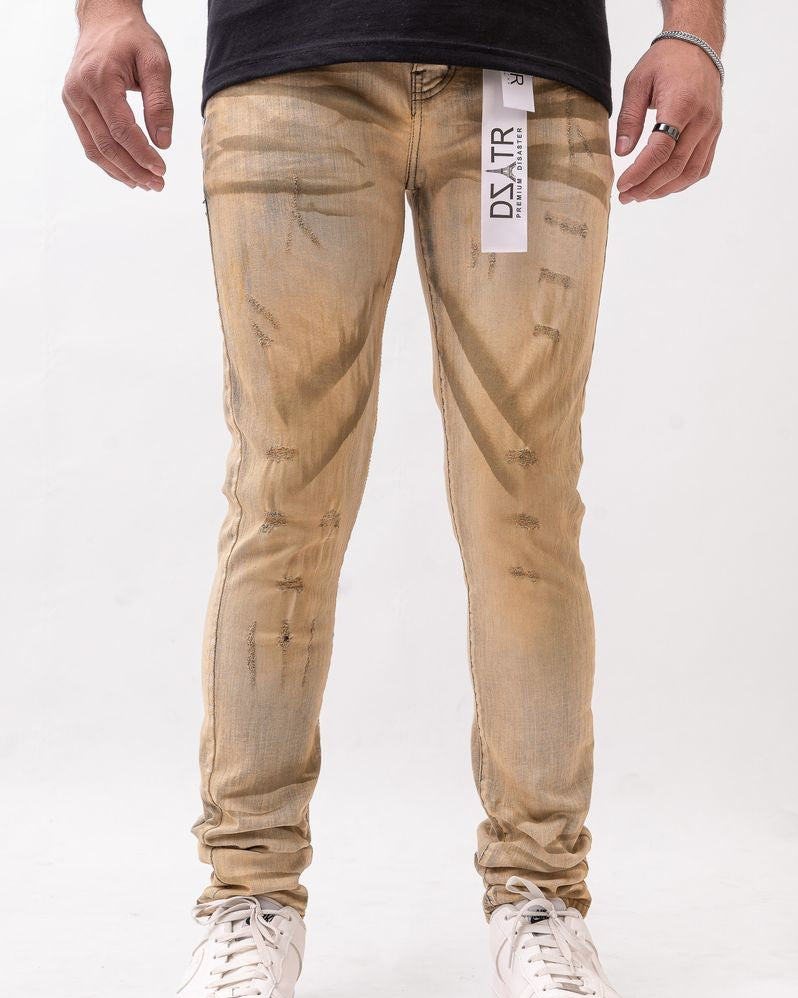 Beige jeans worn by a person on a white background
