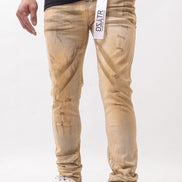 Beige jeans with a brand logo on a white background