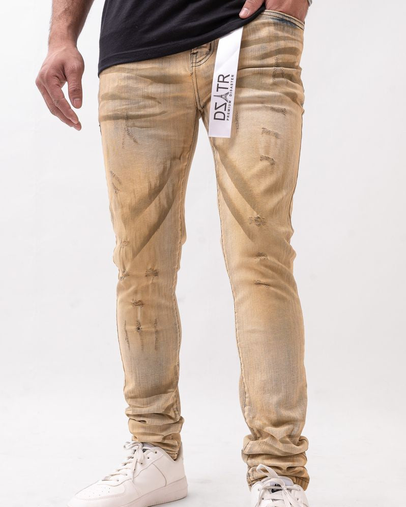 Beige jeans with a brand logo on a white background