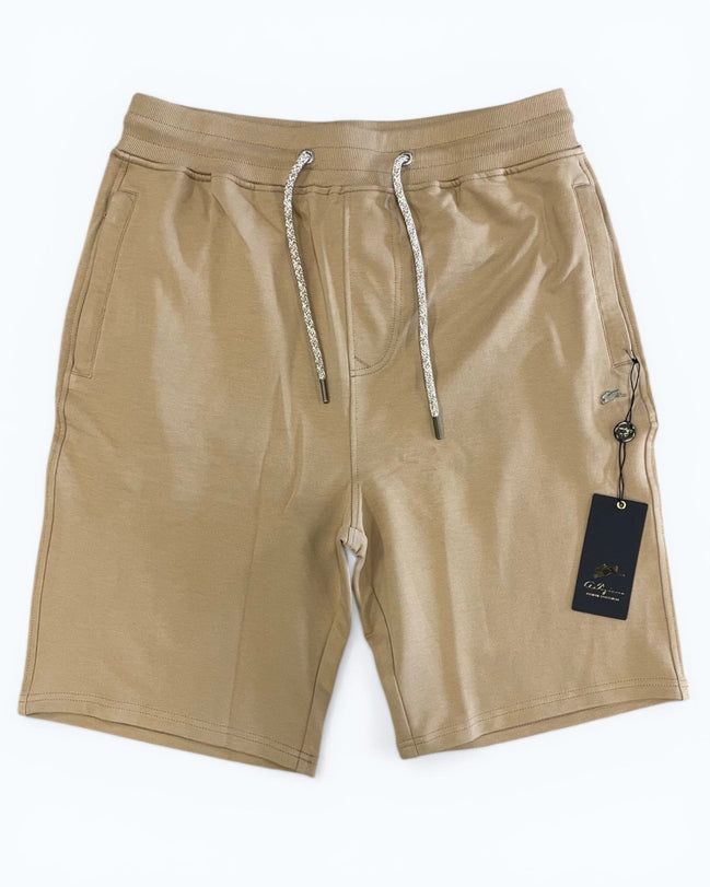 Beige shorts with a drawstring on a white background