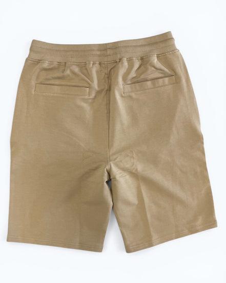 Beige shorts on a white background