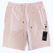 Pink shorts with a drawstring and brand tag on a white background