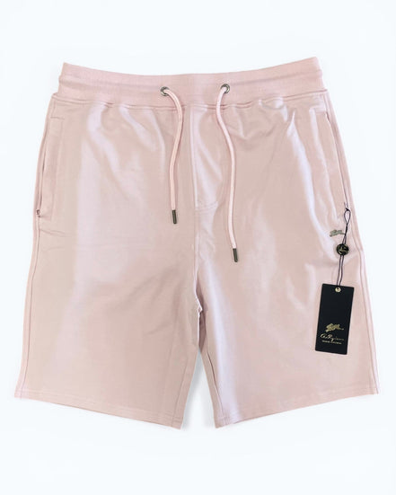 Pink shorts with a drawstring and brand tag on a white background