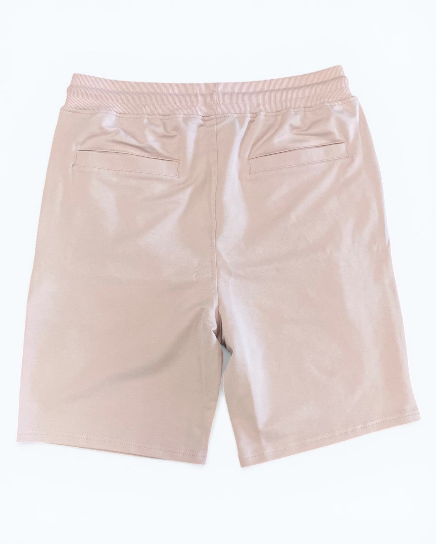 PINK SHORTS on a white background