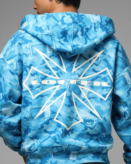 Blue camouflage hoodie with 'LOFTER' branding on the back, worn by a person.