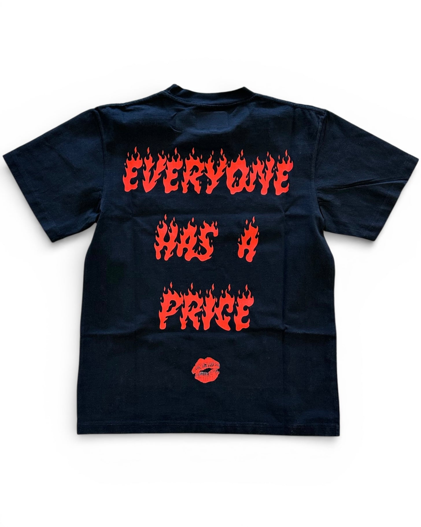 Black t-shirt with red text and a lip print on a white background