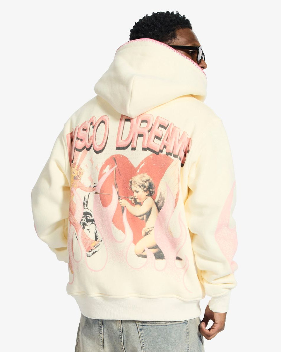 Person wearing a hoodie with 'Disco Dream' text and graphic on the back
