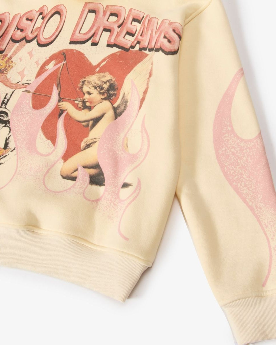 Beige sweatshirt with 'Disco Dreams' design featuring a cherub and heart on a white background