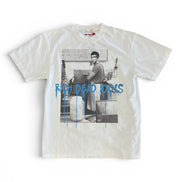 White t-shirt with a graphic design and text on a white background