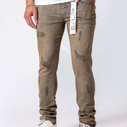 Person wearing distressed gray jeans with a white label on a white background