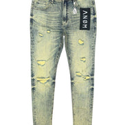 Distressed jeans with a brand label on a white background