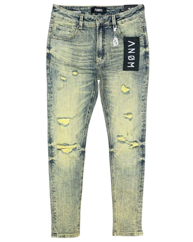 Distressed jeans with a brand label on a white background