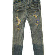 Distressed blue jeans on a white background
